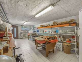 Discover ample storage solutions in this versatile basement space, perfect for organizing your belongings.