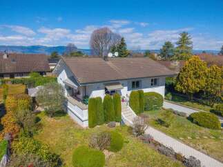 Discover this charming single-family home featuring a well-maintained exterior and a spacious, green yard perfect for outdoor activities.
