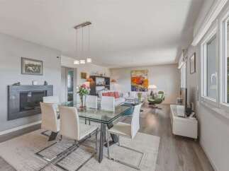 Experience modern living in this spacious open-concept dining and living area, perfect for entertaining.