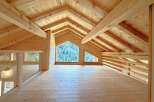 Experience rustic charm and breathtaking views in this stunning wooden loft.