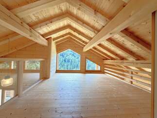 Experience rustic charm and breathtaking views in this stunning wooden loft.