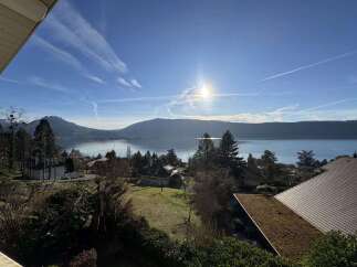 Experience breathtaking lake and mountain views from this stunning property.