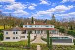Discover this magnificent property featuring a sprawling estate with a luxurious swimming pool and expansive outdoor living spaces.