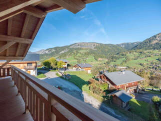 Experience breathtaking mountain views from this charming chalet, perfect for your next alpine getaway.