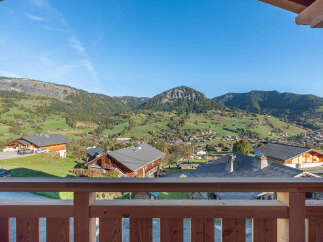 Experience breathtaking mountain views from this charming property, nestled in a picturesque village setting.