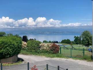 Experience breathtaking lake views from this stunning property, perfectly situated to capture the serene beauty of the water and distant shores.