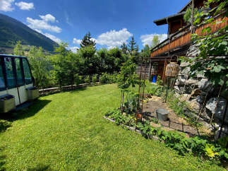 Experience the charm of this unique property featuring a picturesque garden with lush greenery and a charming vegetable patch, perfect for those who love to cultivate their own produce.