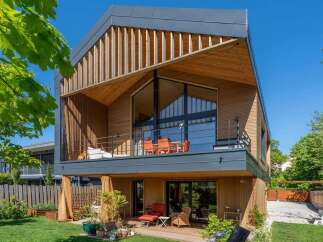 Experience modern living in this stunning architectural gem, featuring a unique multi-level design with expansive windows and natural wood accents.
