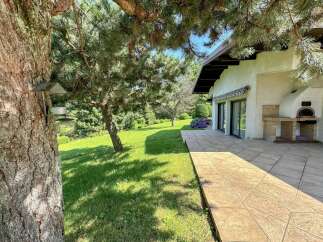 Enjoy outdoor living with this charming property featuring a spacious patio perfect for entertaining and a built-in brick oven for delicious meals.