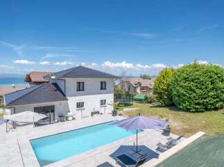 Experience luxurious living in this stunning property featuring a pristine swimming pool and ample outdoor space perfect for relaxation and entertainment.