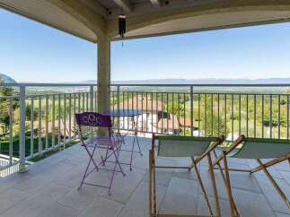 Enjoy breathtaking panoramic views from this stunning balcony, perfect for relaxing or entertaining.