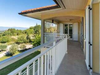 Enjoy breathtaking panoramic views from this stunning balcony, perfect for savoring your morning coffee or evening sunsets.
