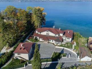 Experience unparalleled luxury with this stunning waterfront estate, boasting breathtaking lake views and exquisite architecture.