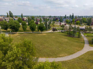 Discover this charming suburban neighborhood with beautifully maintained homes and lush green spaces.