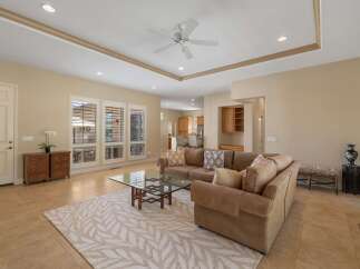 Step into this inviting living room, featuring a plush sectional sofa perfect for relaxation and entertaining.