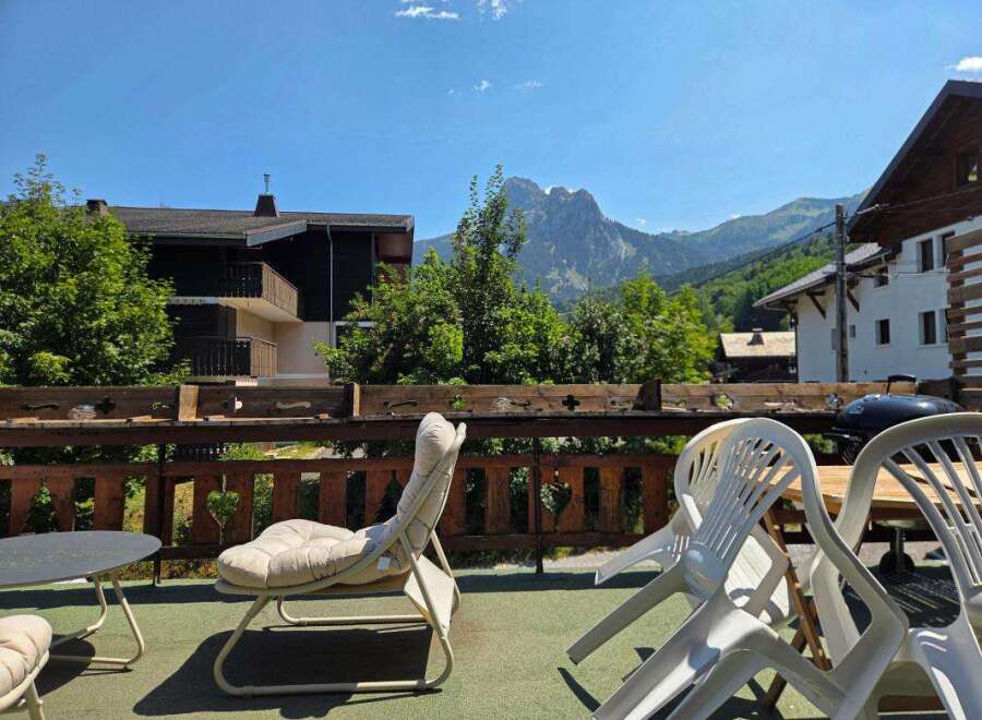 Enjoy breathtaking mountain views from this charming balcony, perfect for morning coffee or evening relaxation.