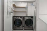 This laundry room features a modern LG washer and dryer set, perfect for handling large loads.