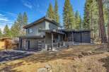 Experience modern mountain living in this stunning contemporary home, nestled amongst towering pine trees.