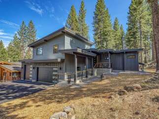 Experience modern mountain living in this stunning contemporary home, nestled amongst towering pine trees.