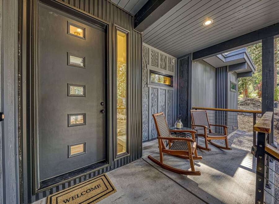 Welcome guests to your modern mountain retreat with this inviting entryway.