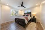 Experience rustic charm and modern comfort in this inviting bedroom.