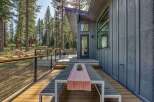 Experience modern mountain living with this stunning property featuring a spacious deck perfect for outdoor entertaining.