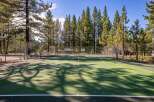 Enjoy an active lifestyle with this fantastic tennis court, perfect for residents of this property.
