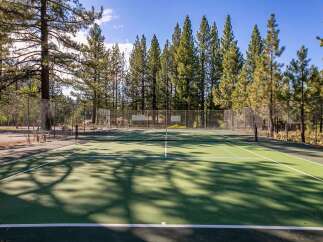 Enjoy an active lifestyle with this fantastic tennis court, perfect for residents of this property.