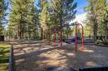 Enjoy outdoor fun at this property's dedicated playground, featuring swings and climbing structures perfect for children.
