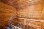 Experience ultimate relaxation in this beautifully crafted wooden sauna.