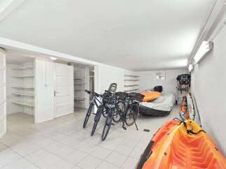 Discover ample storage and recreational possibilities in this versatile space.