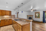 Discover this charming kitchen and living area, perfect for cozy gatherings.