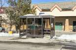 Discover convenient transit options with this Steamboat Springs Transit bus stop, featuring a sheltered waiting area and clear signage.