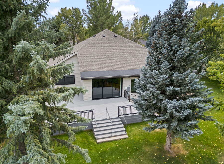 Experience modern living with this stunning home featuring a spacious deck perfect for outdoor entertaining.