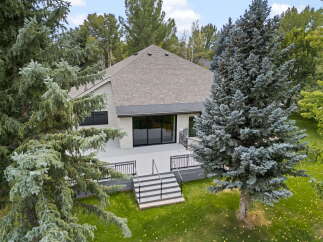 Experience modern living with this stunning home featuring a spacious deck perfect for outdoor entertaining.