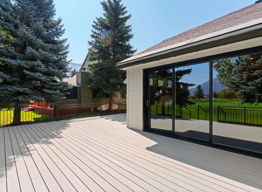 Step outside onto a spacious, modern deck perfect for entertaining or relaxing with stunning mountain views.