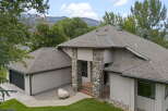 Discover this stunning home featuring a unique stone-accented entrance and a spacious garage.