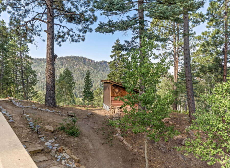 Discover a serene mountain retreat with breathtaking views of rolling hills and lush forests.