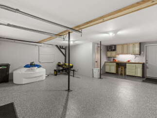 Discover this versatile garage space, perfect for storage and hobbies.