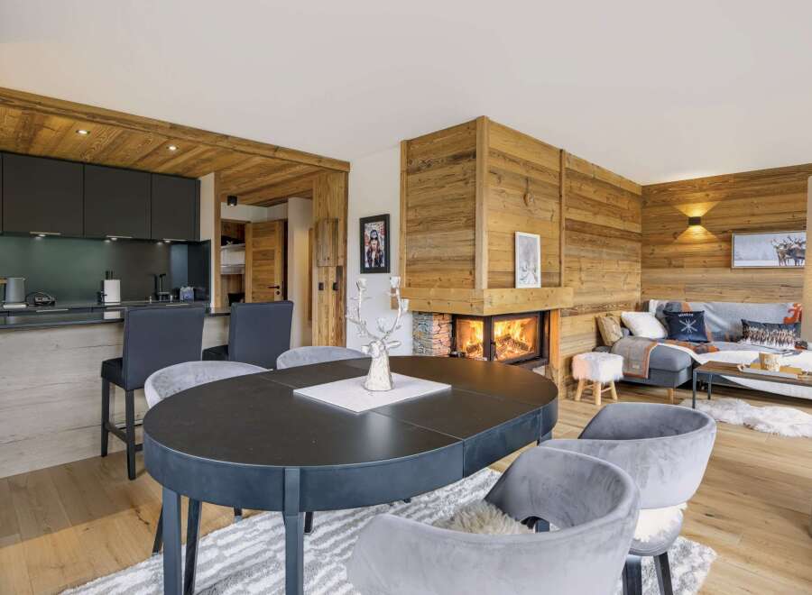 Experience rustic charm and modern comfort in this stunning living and dining area.