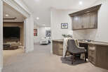 Discover this inviting basement living space, perfect for relaxation and productivity.
