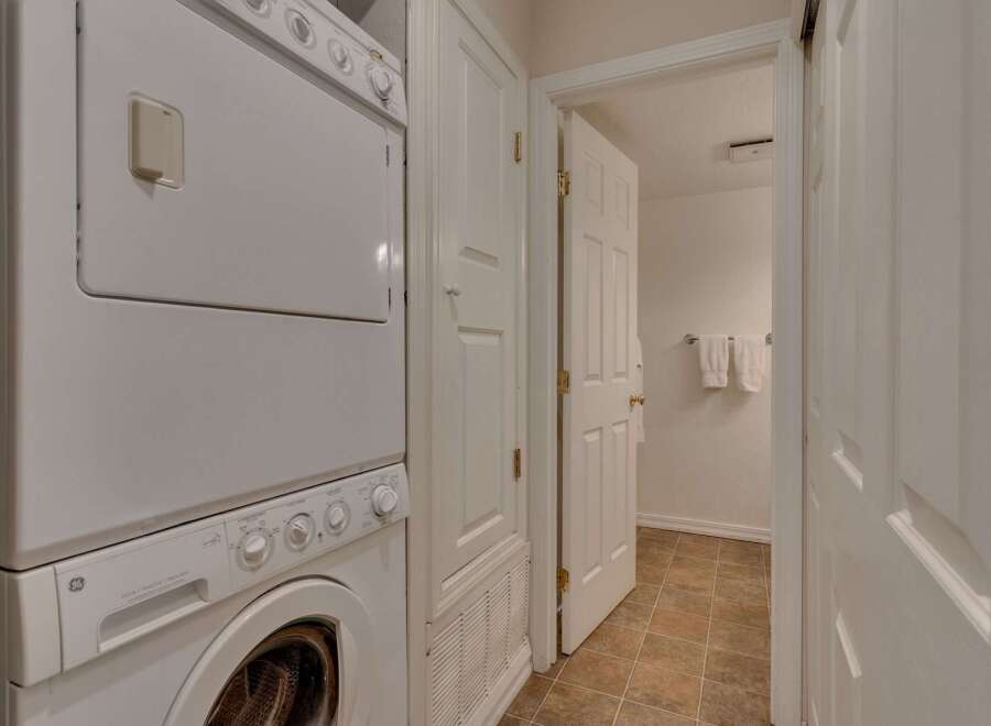 This property features a convenient stacked washer and dryer unit, perfect for maximizing space in your laundry area.