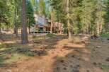 Nestled amidst a serene pine forest, this property offers a tranquil retreat with its charming multi-unit building.