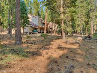Nestled amidst a serene pine forest, this property offers a tranquil retreat with its charming multi-unit building.