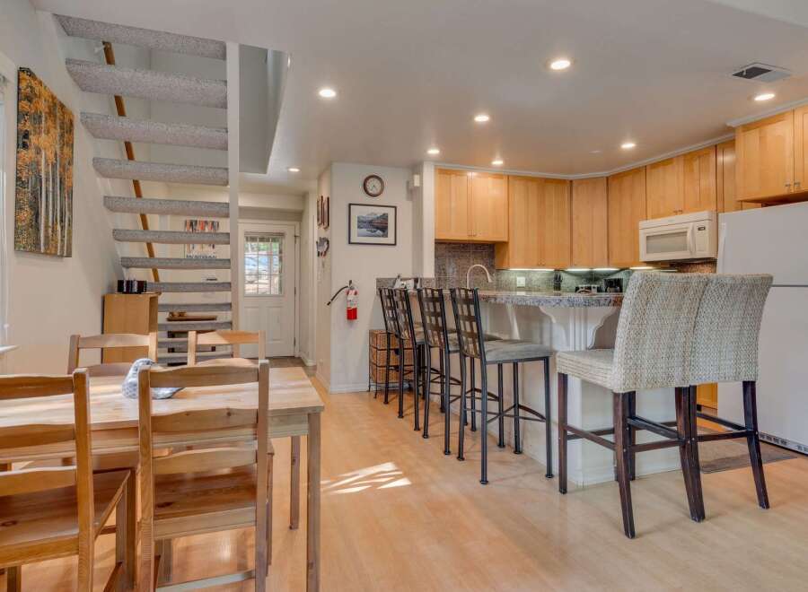 This charming kitchen and dining area offers a perfect blend of functionality and style.