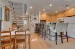 This charming kitchen and dining area offers a perfect blend of functionality and style.
