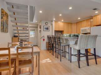 This charming kitchen and dining area offers a perfect blend of functionality and style.