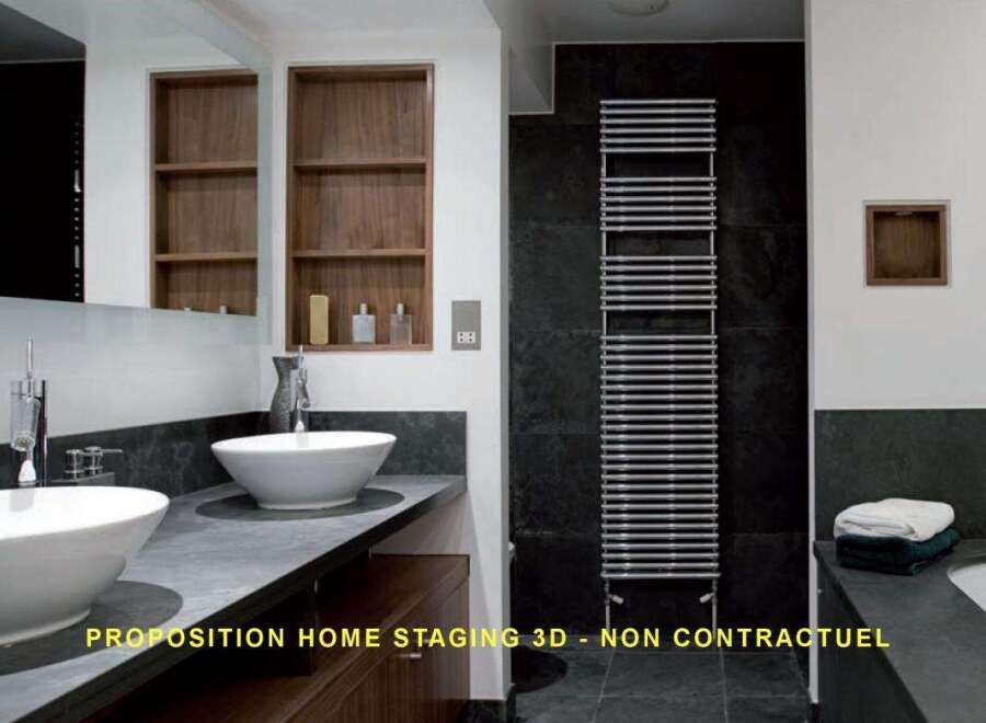 Experience modern luxury in this stunning bathroom featuring dual vessel sinks atop a sleek, dark countertop.