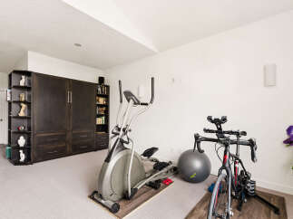 Transform your home into a personal fitness sanctuary with this dedicated workout space.