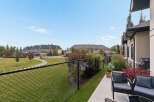 Enjoy outdoor living in this charming property featuring a private patio with comfortable seating and a barbecue grill.
